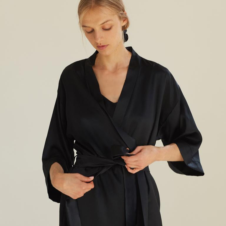 Black Model wearing a black silk robe by Dariia Day, front view with a tied belt, showcasing the elegance and premium design.