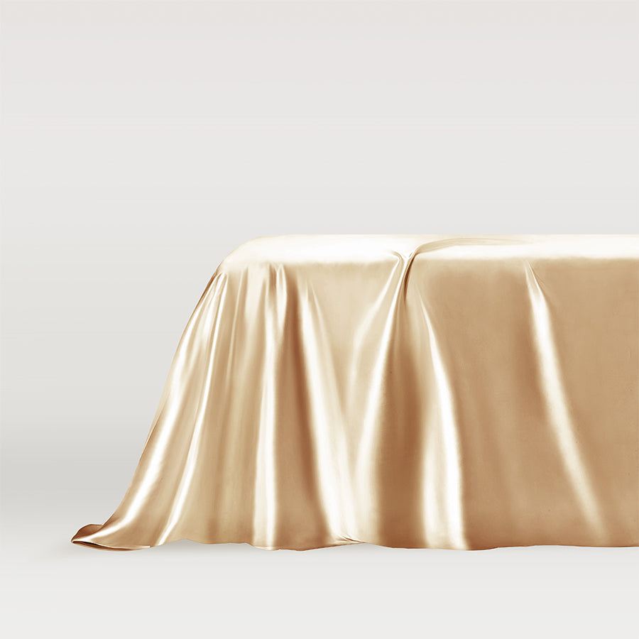 Beige Luxurious French beige silk sheet draped elegantly over a bed, showcasing premium quality by Dariia Day