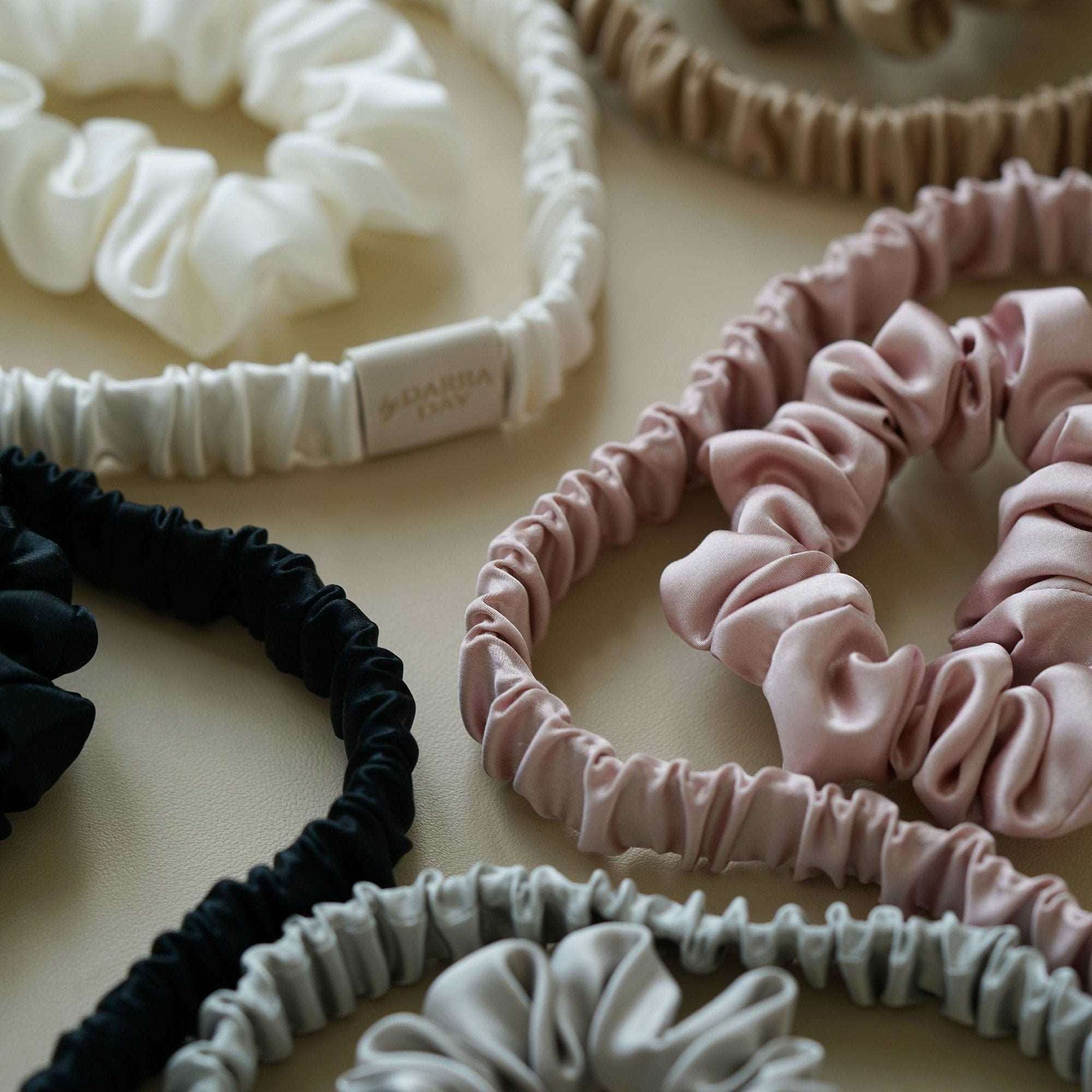 Grey Luxury  silk scrunchies by Dariia Day, ideal for a thoughtful and stylish gift.