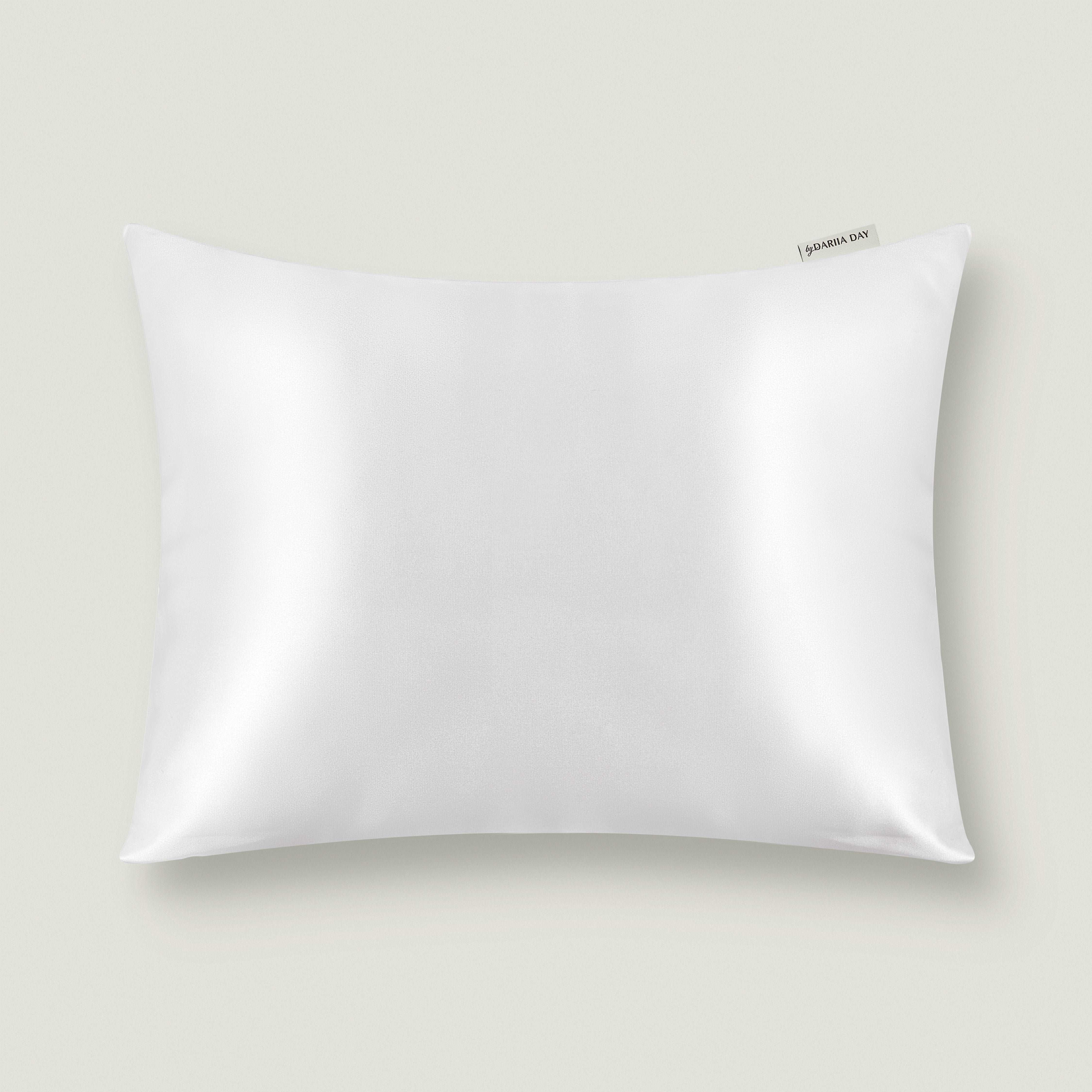 White Dariia Day luxurious silk travel pillow in Powder White, designed for elegant comfort and smooth texture.