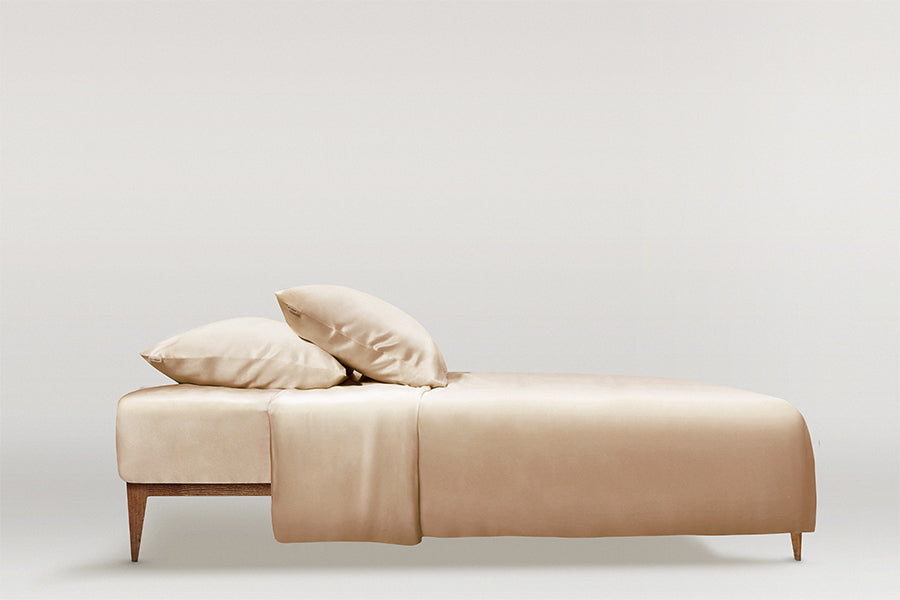 Luxurious French beige silk bed set with pillowcases and duvet cover, simple and modern bedding design