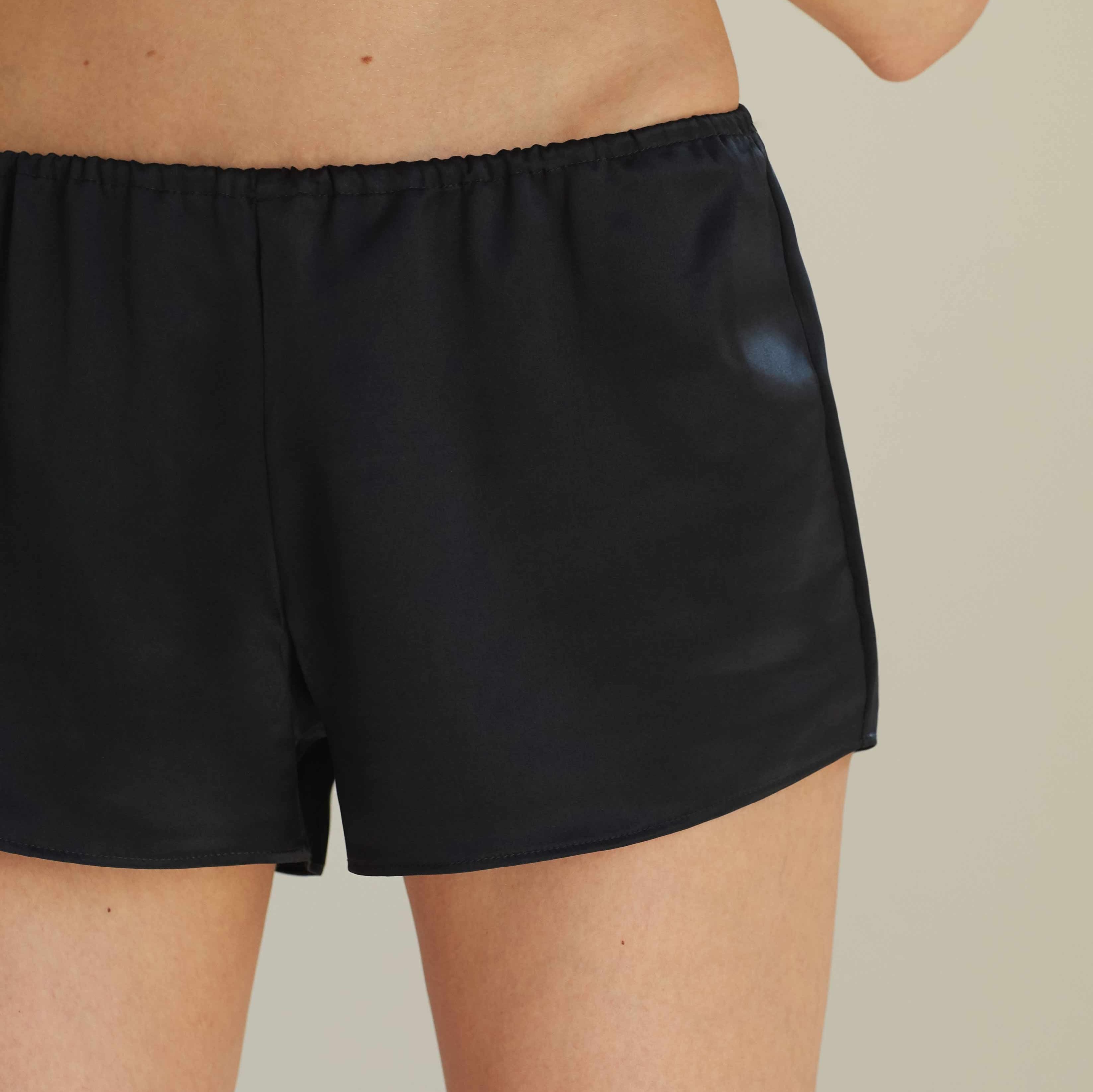 Front view of black silk shorts by Dariia Day, designed for ultimate comfort and sophistication.