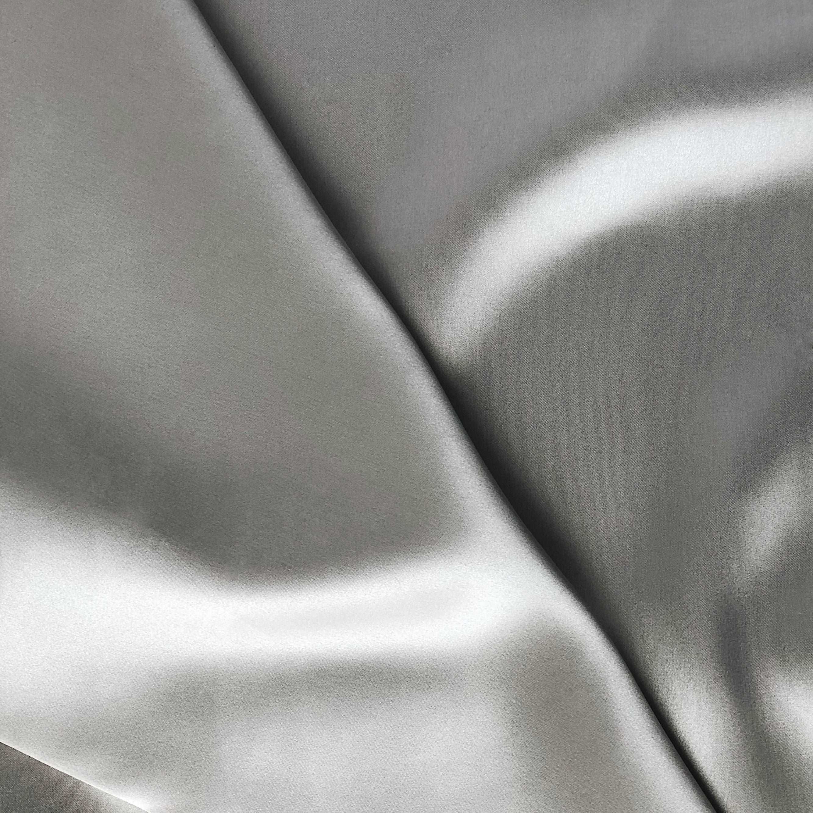 Close-up of silver grey silk fabric from the by Dariia Day luxury silk pillowcase collection.