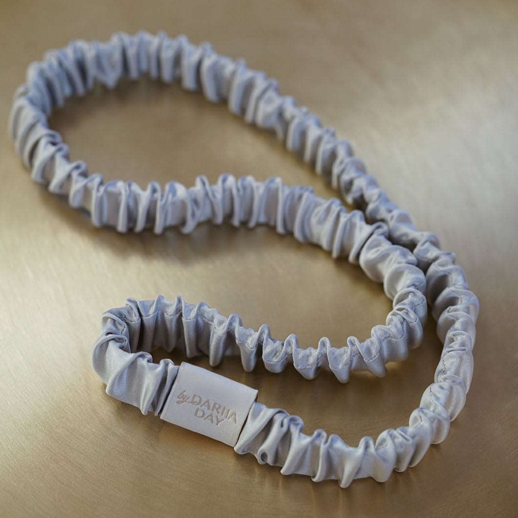 Grey Luxury grey silk scrunchie by Dariia Day in a beautifully presented gift box, ideal for a thoughtful and stylish gift.