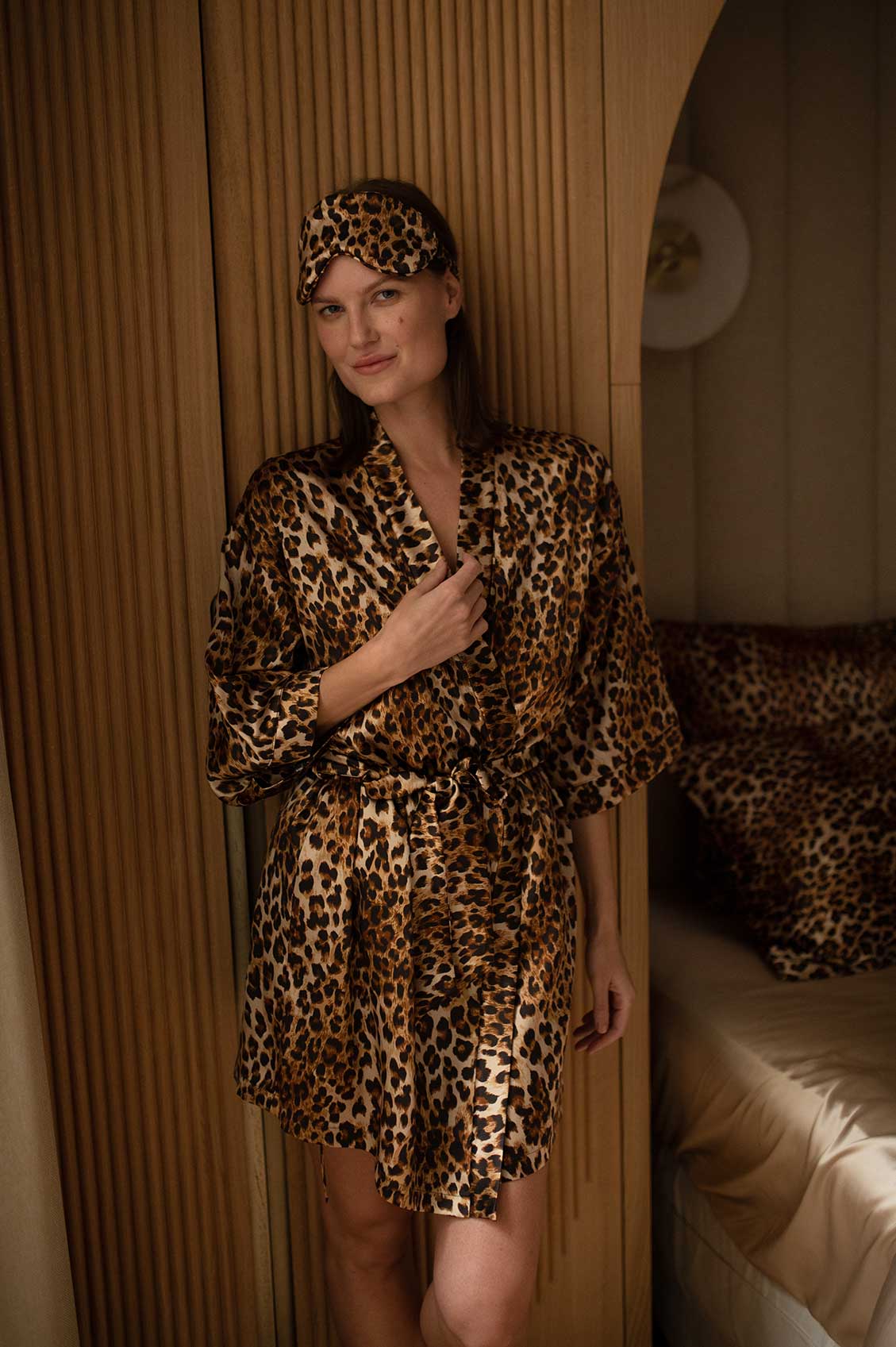 Luxurious leopard print silk robe and matching eye mask crafted from 25 momme mulberry silk, perfect for adding elegance and comfort to your loungewear collection.