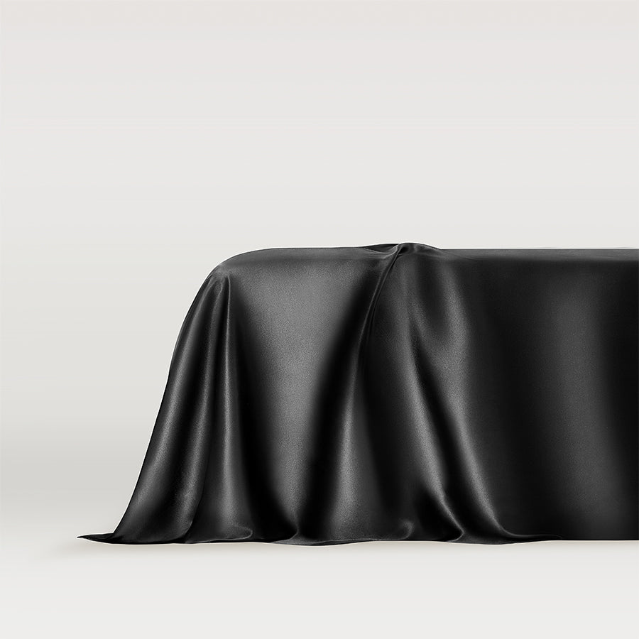 Black Midnight black silk flat bed sheet, luxurious and smooth bedding by Dariia Day, perfect for enhancing your sleep quality with premium silk materials.