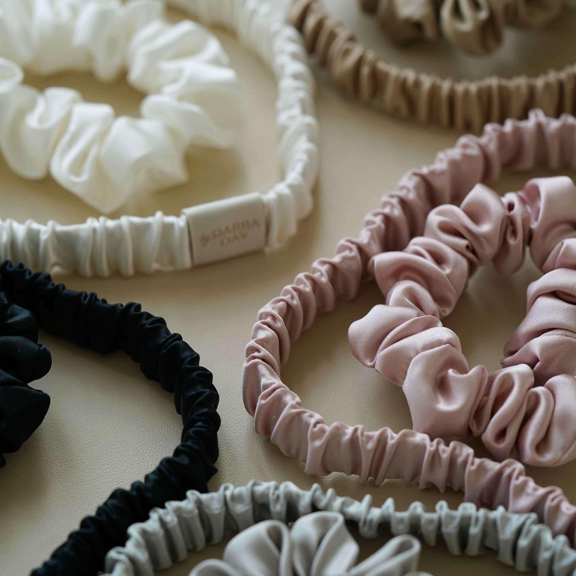 Luxury  silk scrunchies by Dariia Day, ideal for a thoughtful and stylish gift.