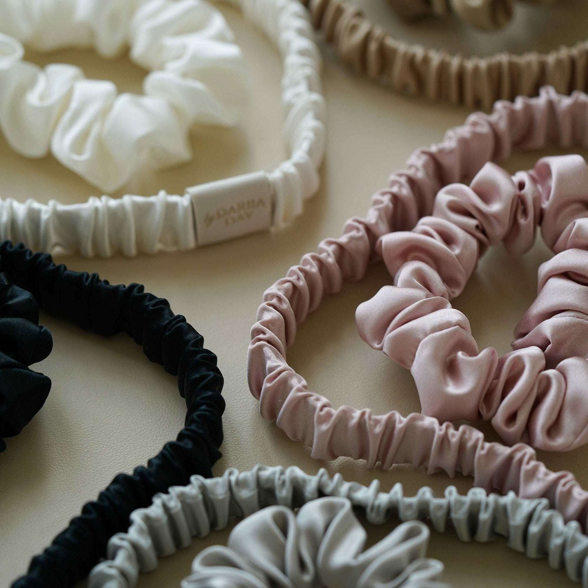 Luxury  silk scrunchies by Dariia Day, ideal for a thoughtful and stylish gift.