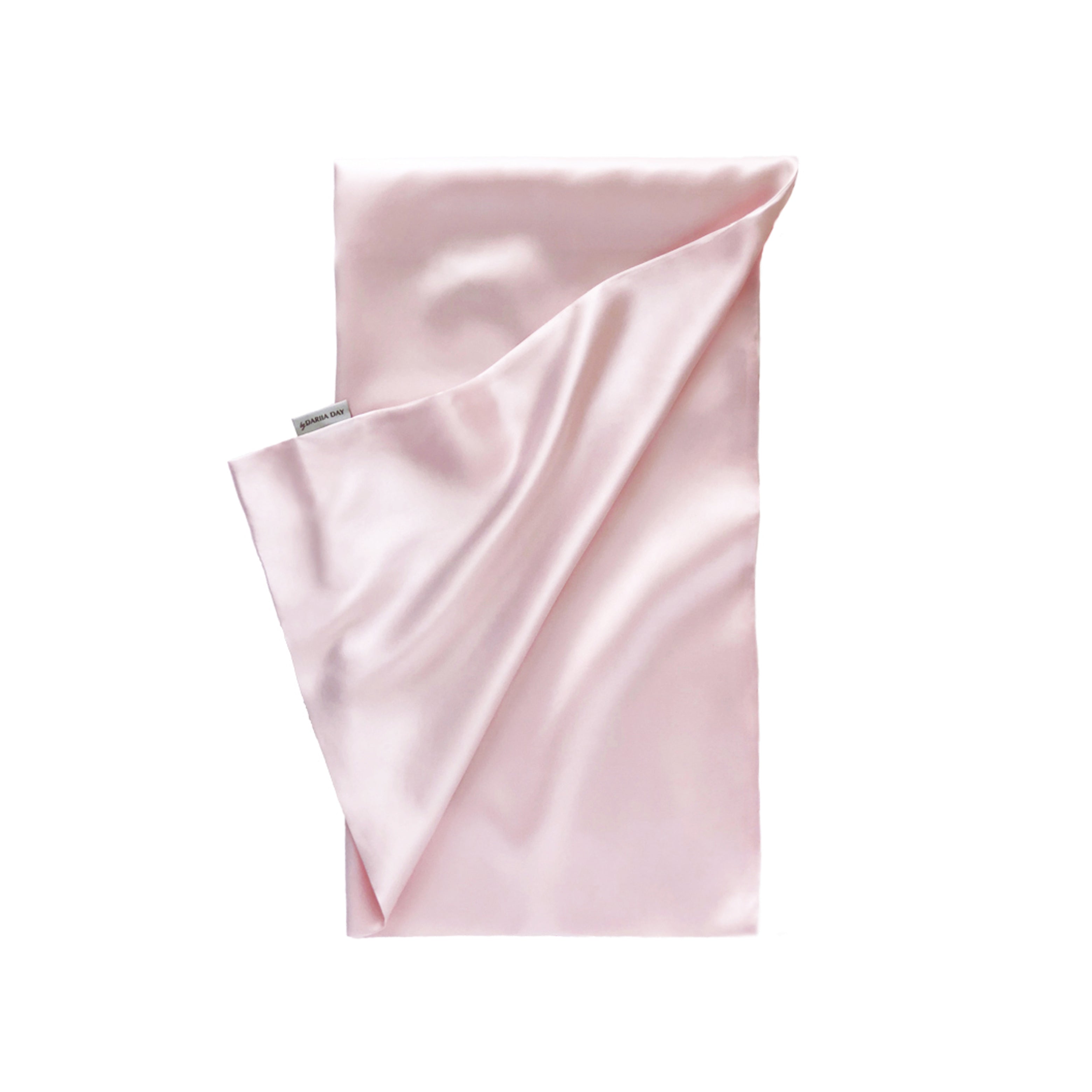 Luxurious pink silk pillowcase by Dariia Day, designed for beauty sleep and skin care.
