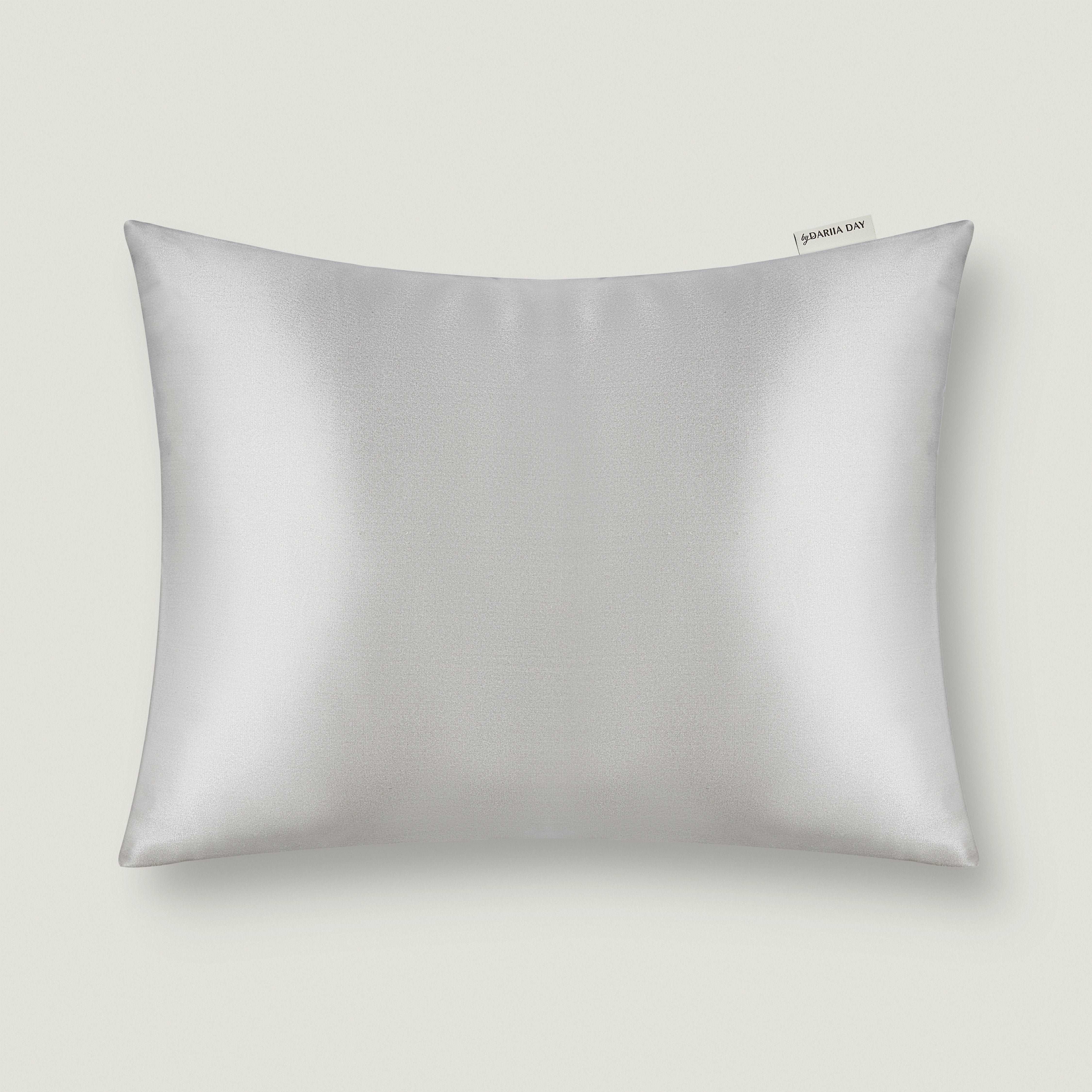 Silver grey silk pillowcase designed for beauty sleep by Dariia Day, displayed flat.