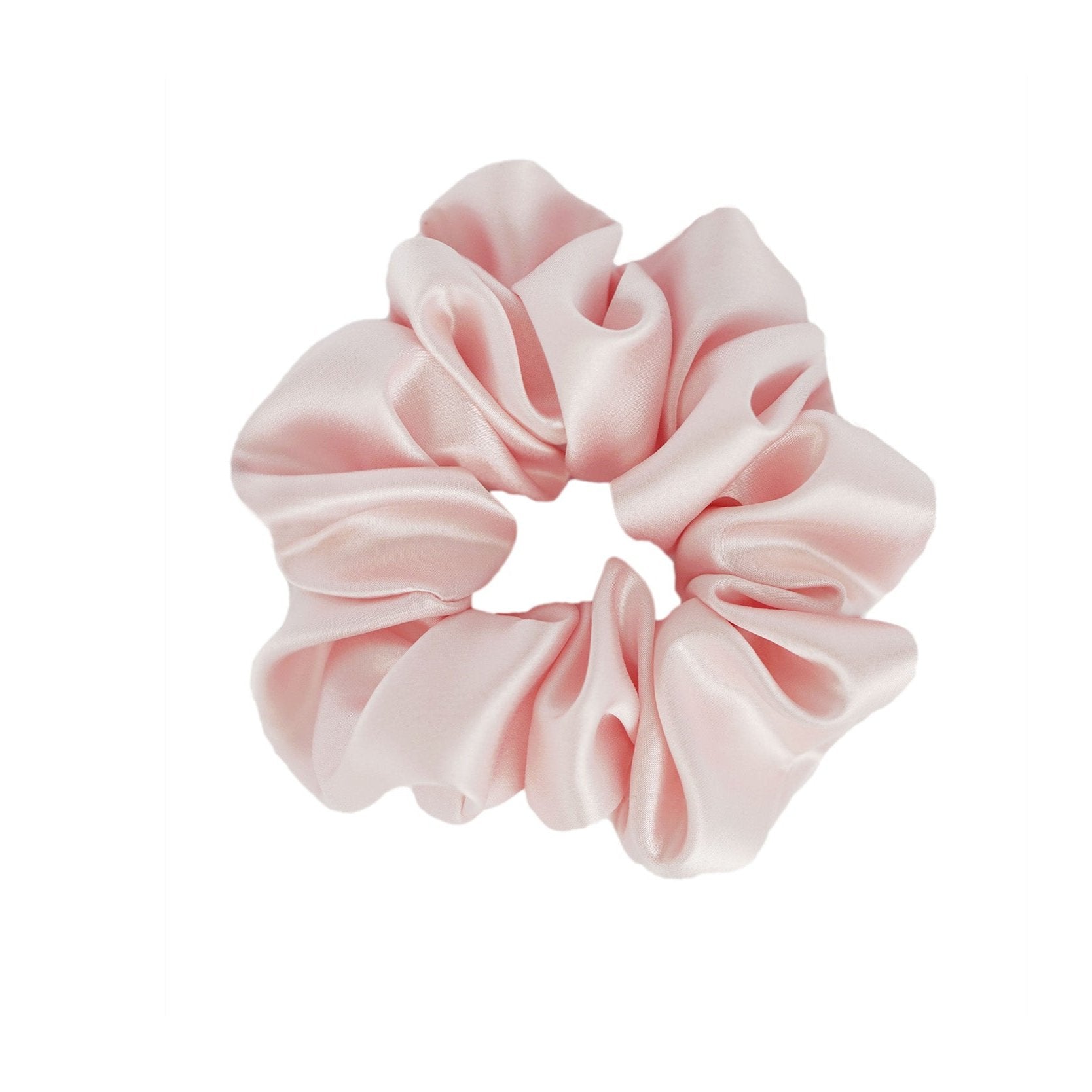 Blush pink silk scrunchie by Dariia Day, soft and luxurious, perfect for delicate hair care