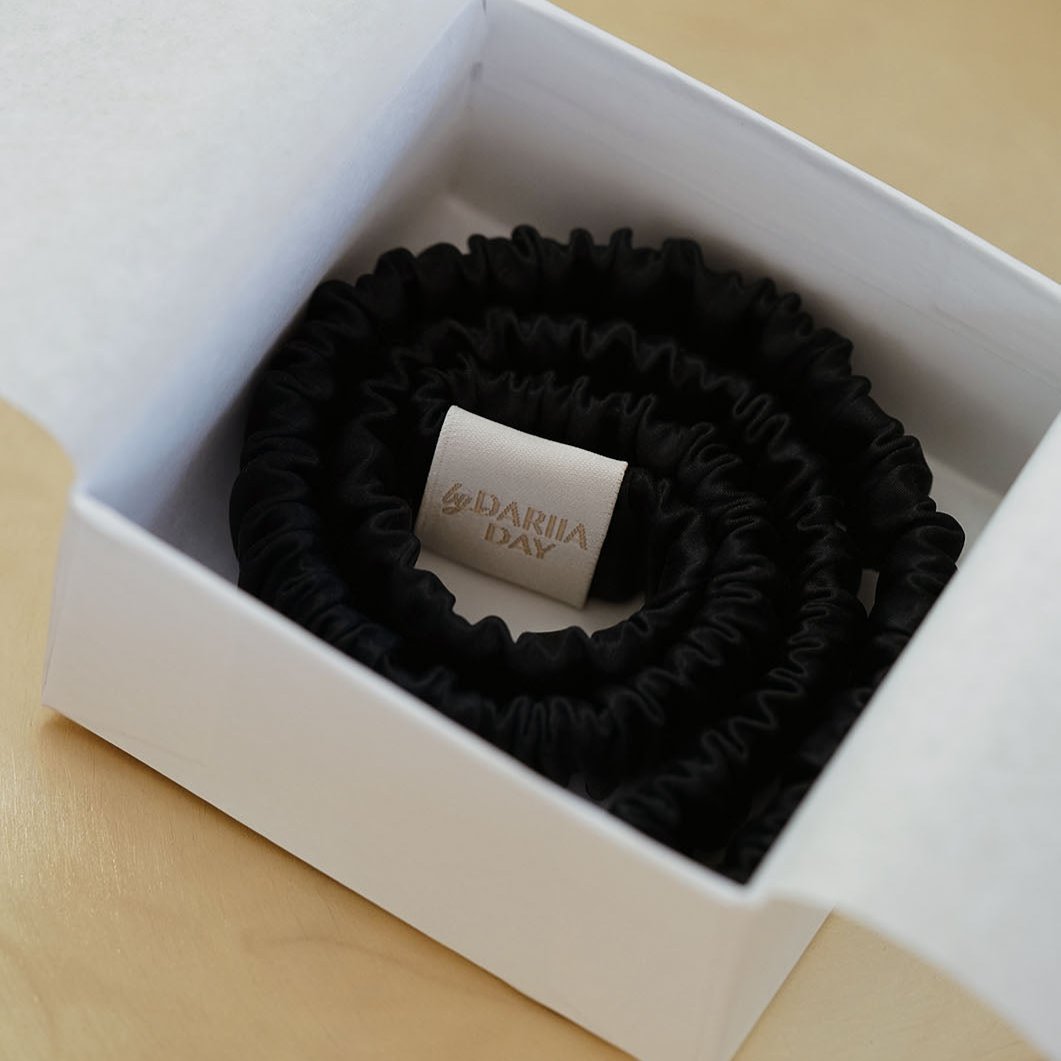 Midnight Black silk scrunchie by Dariia Day beautifully presented in a white gift box.