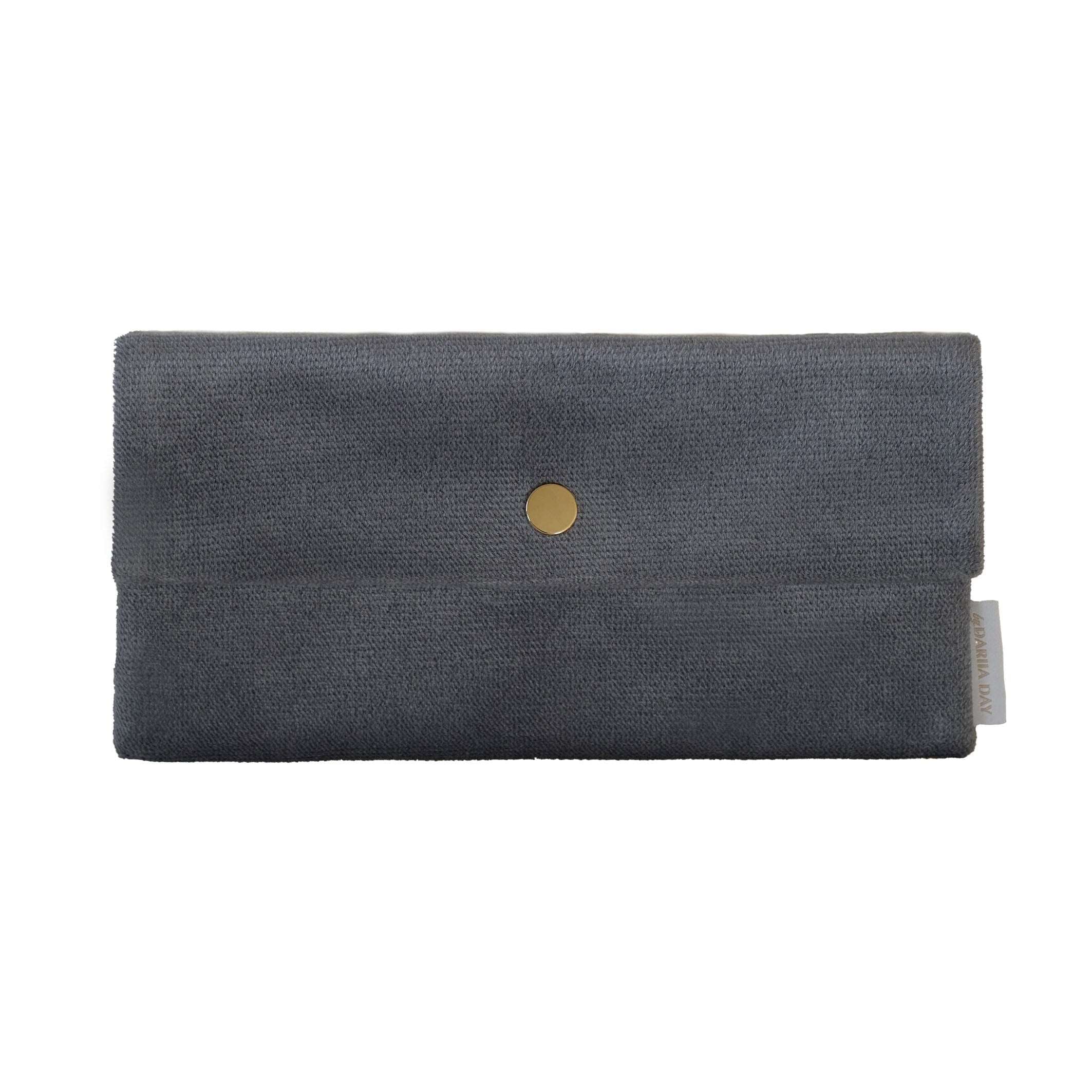 Front view of the Dariia Day Moonstone Velvet Pouch with a gold button detail and Dariia Day label.