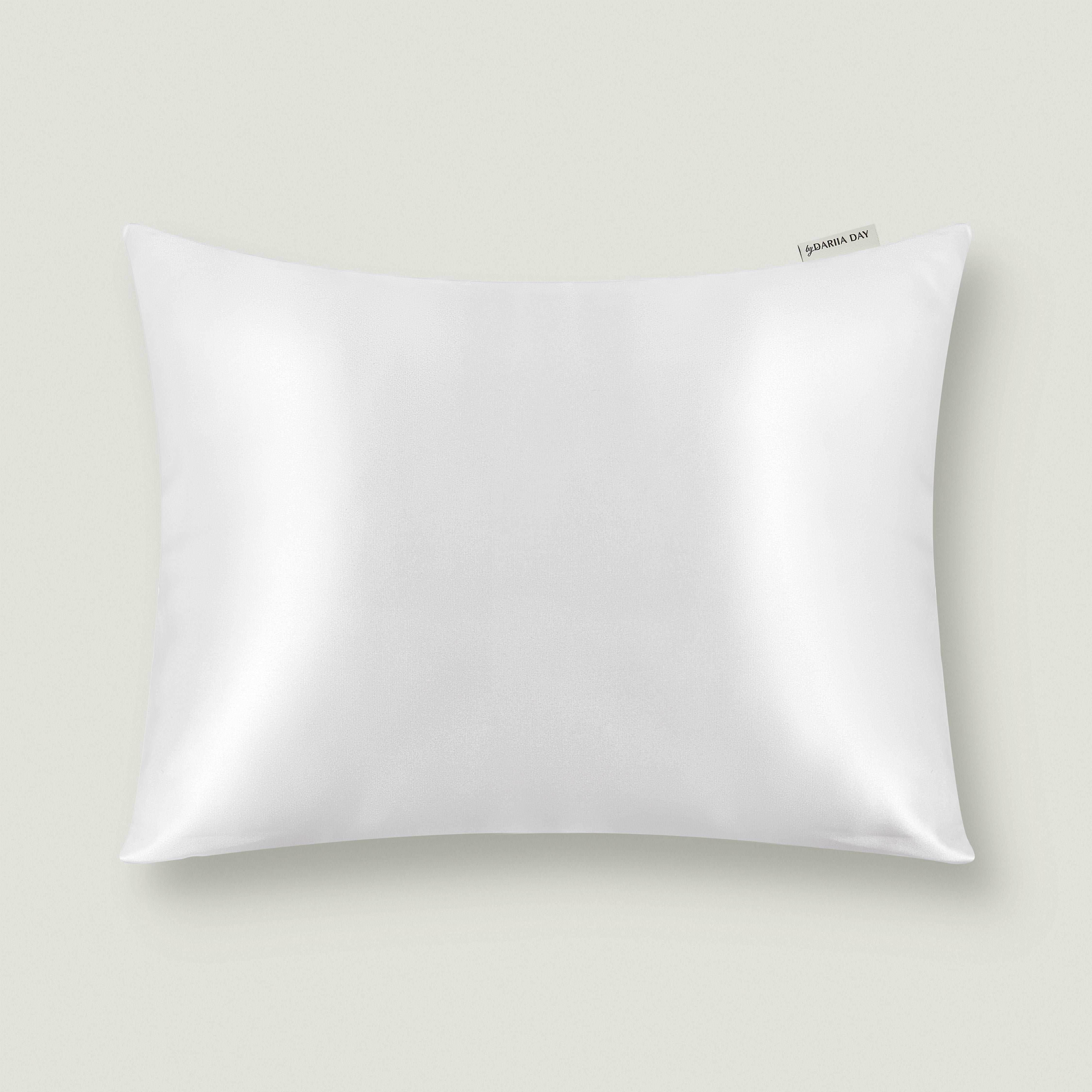 White Dariia Day luxurious silk travel pillow in Powder White, designed for elegant comfort and smooth texture.