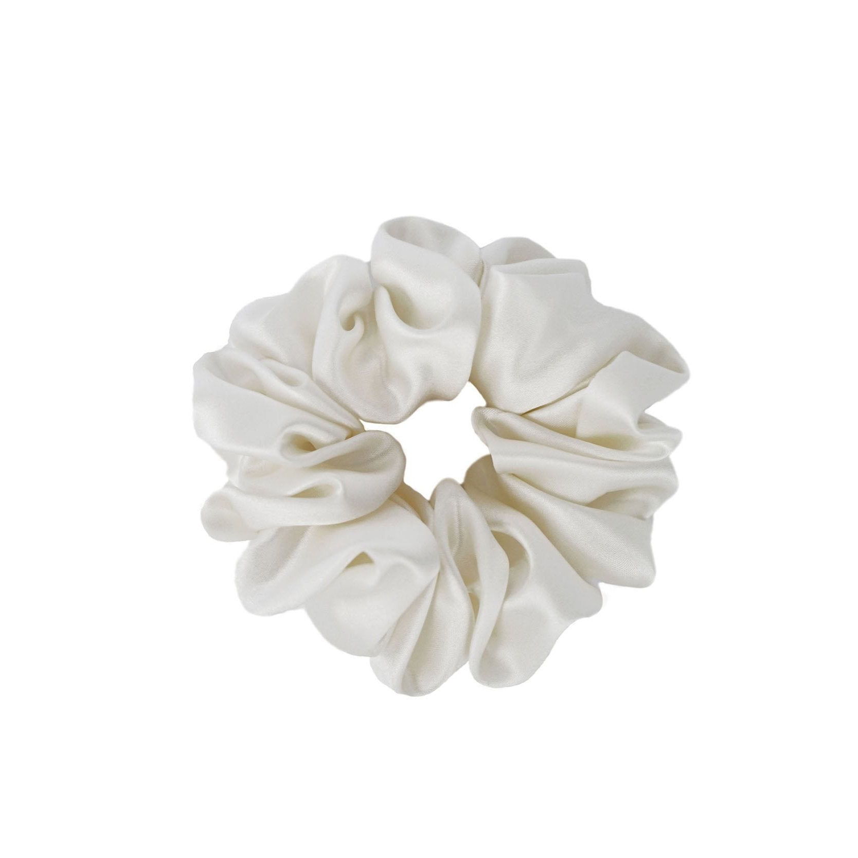 Medium-sized powder white silk scrunchie by Dariia Day, shown in a soft and luxurious style for hair protection.