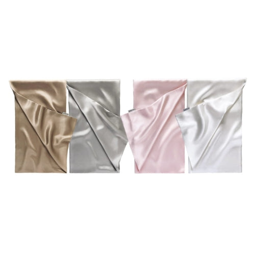 Set of 4 silk pillowcases in beige, grey, pink, and white by Dariia Day, designed for children's luxury bedding.