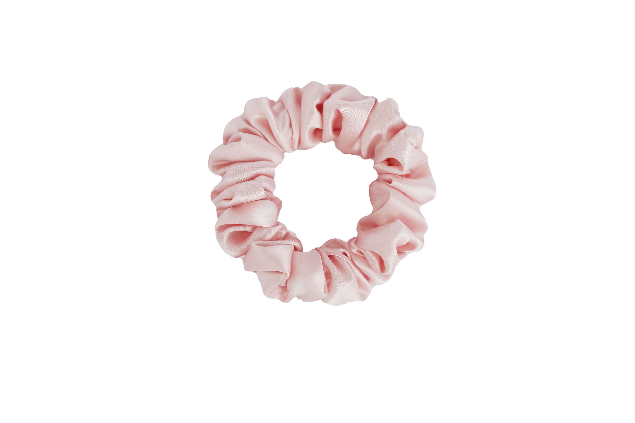 Small blush pink silk scrunchie by Dariia Day, soft and luxurious, perfect for delicate hair care