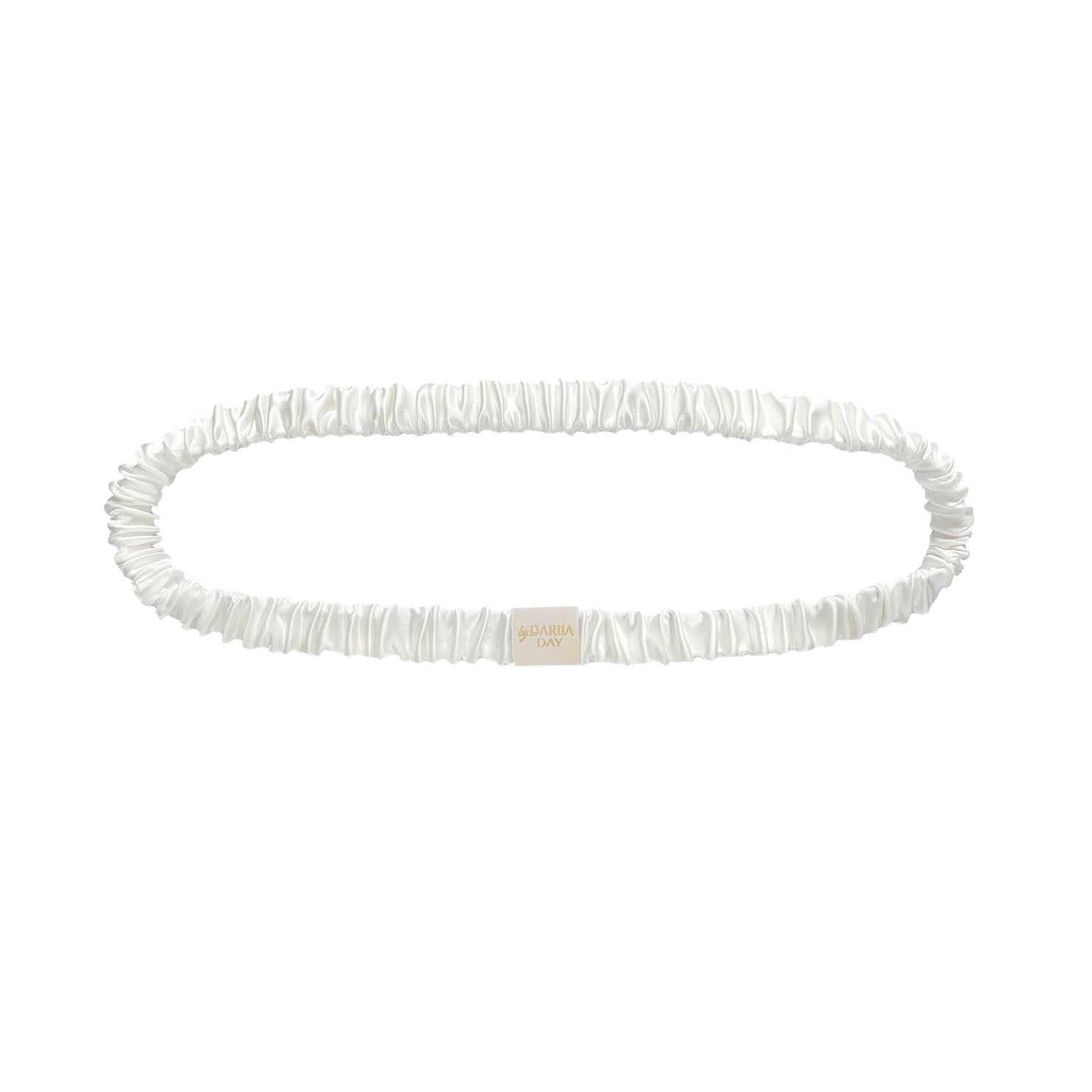 White silk headband by Dariia Day,  its smooth silk fabric and elegant design for luxury hair care.